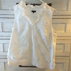 Talbots sleeveless top with raised flour motif.
